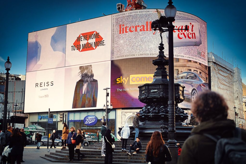 people walking on piccadilly circus