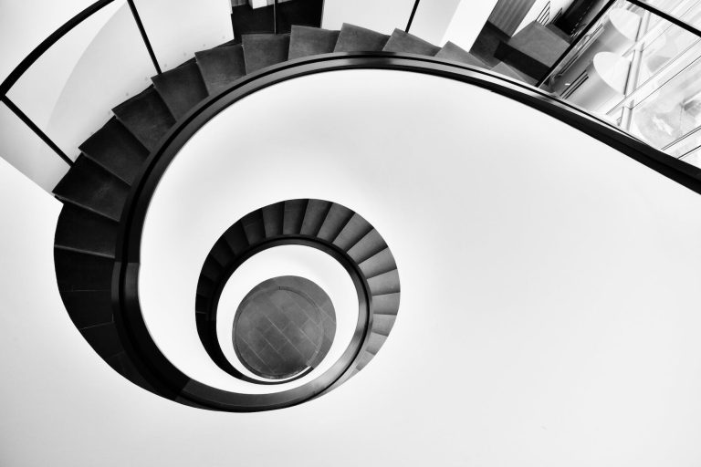 aerial photo of black spiral staircase