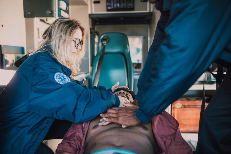 paramedic performing cpr